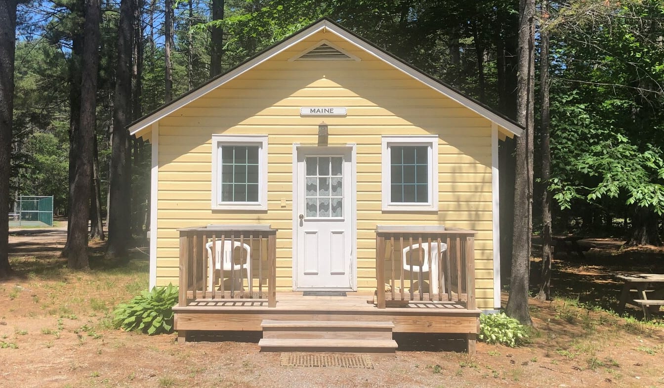 Small Yellow building with nameplate Maine